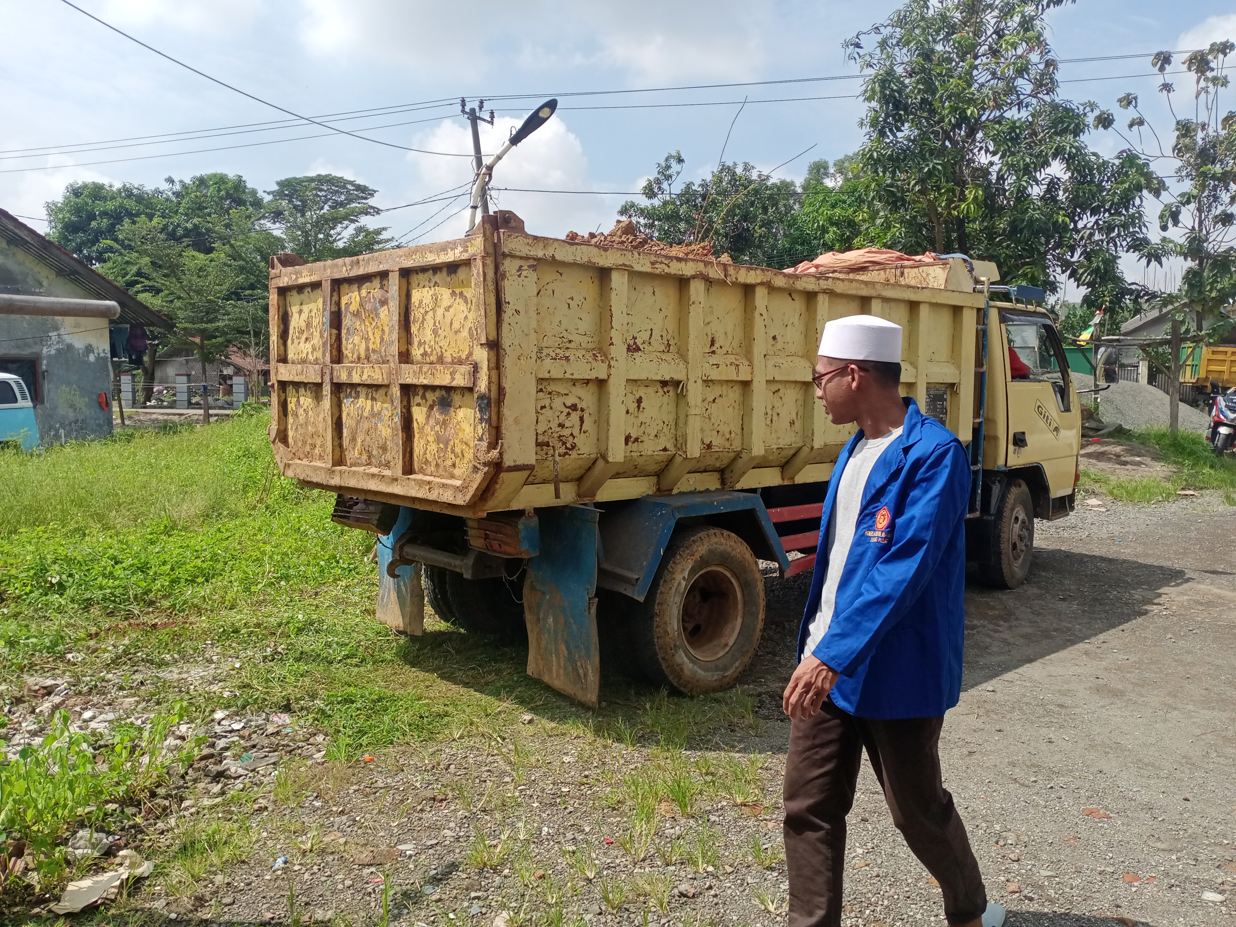 bantuan pengurugan Tanah